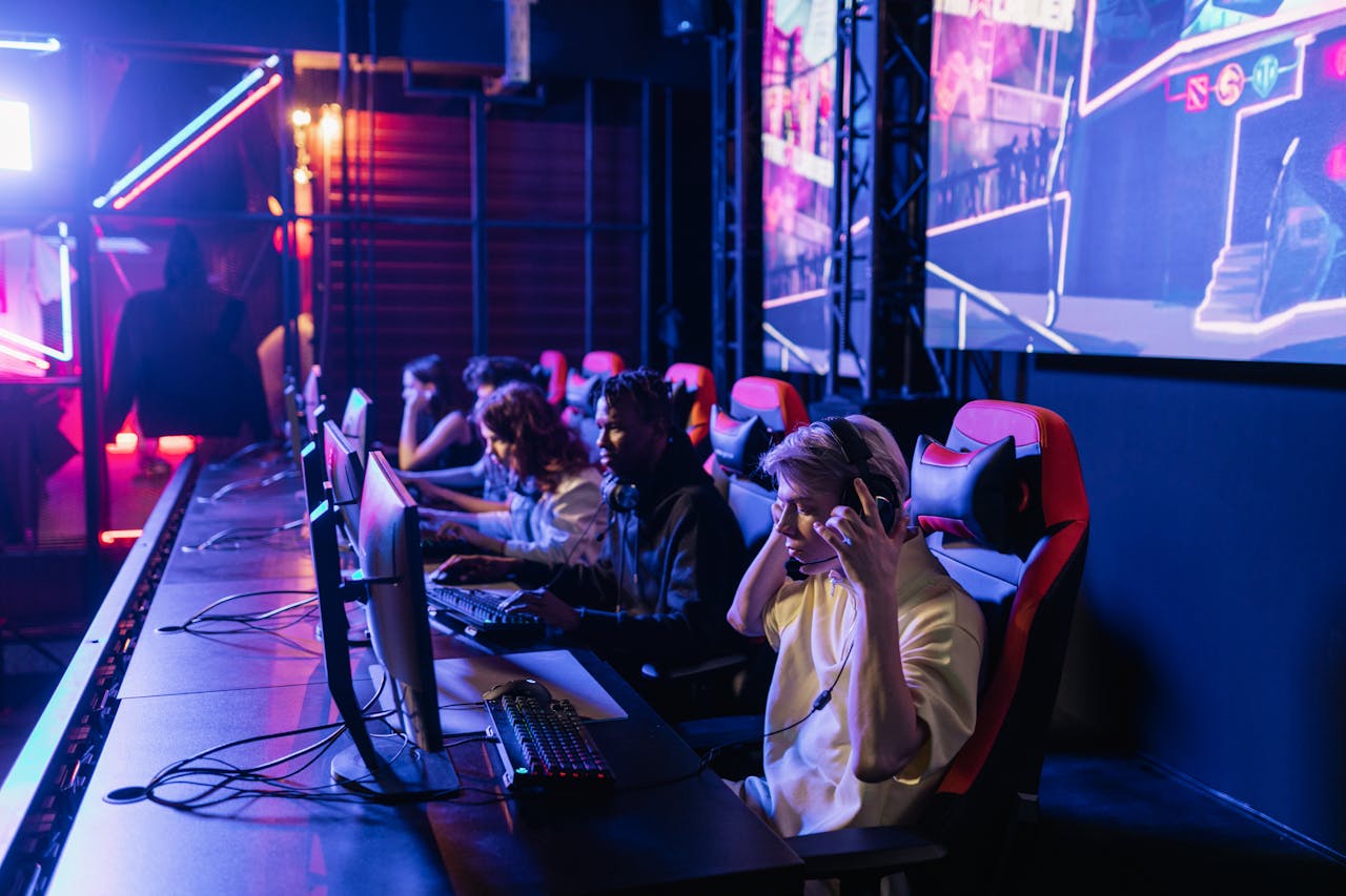 The Art of Drawing Readers In: Your attractive post title goes here Focused gamers in a high-tech arena compete intensely, showcasing esports fervor.
